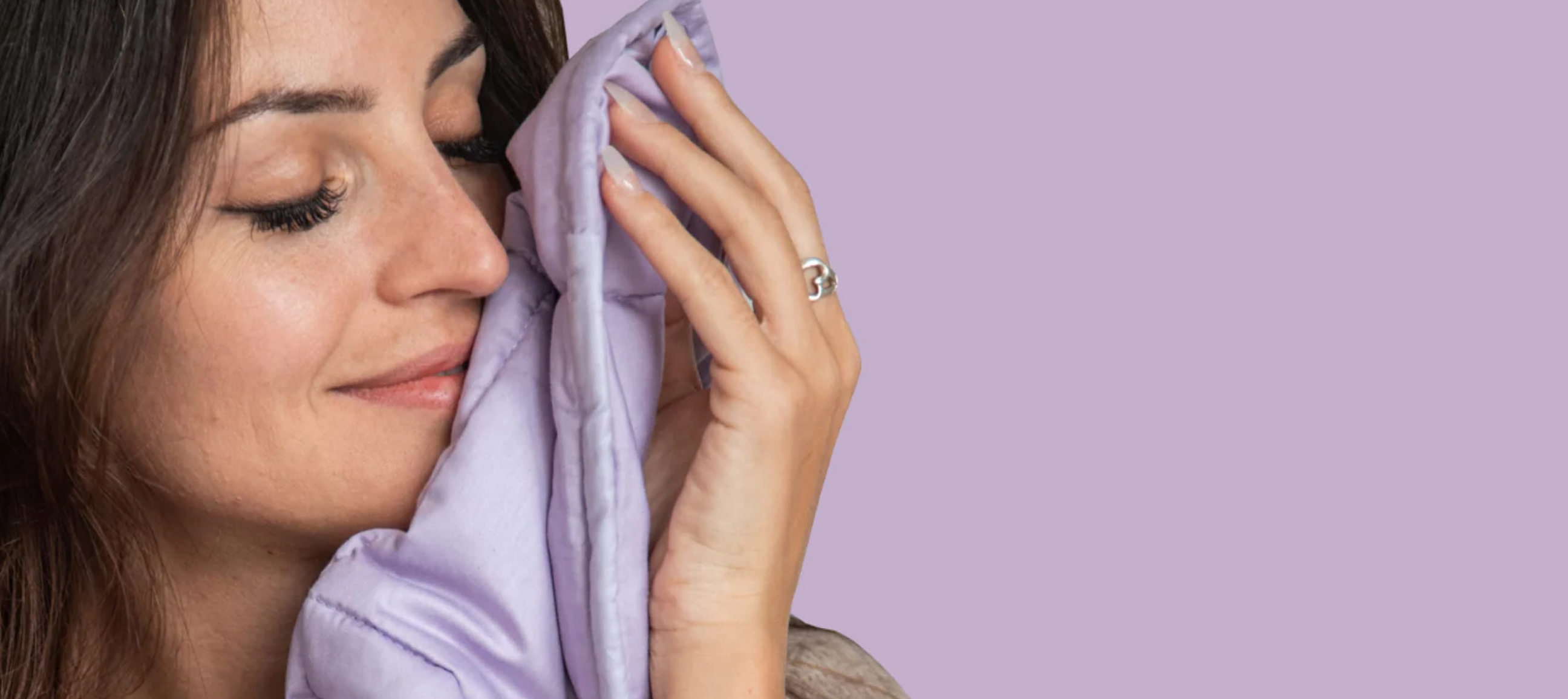 Woman using a blanket from Essential Blankets brand